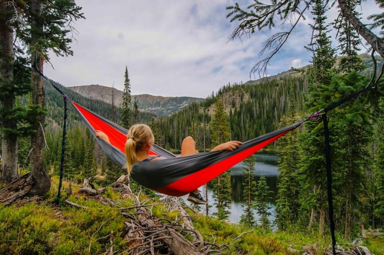 Camping tent near a mountain lake